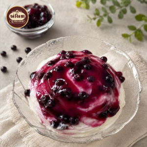 Blueberry Cheesecake Matho Ahmedabad with rich blueberry topping