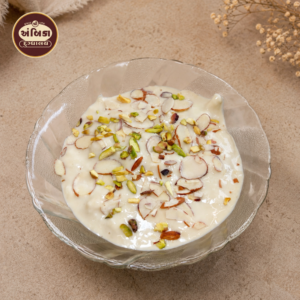 Traditional Rabdi Ahmedabad garnished with sliced almonds and pistachios.